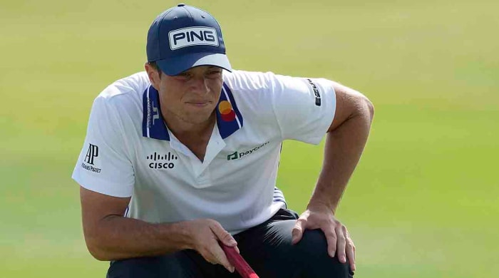 Viktor Hovland lines up his putt during the 2023 Hero World Challenge at the Albany Golf Club, in New Providence, Bahamas.